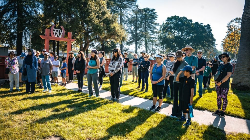 Group of people standing in front of the William S Hart Ranch House.